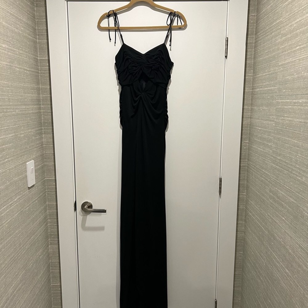 Beautiful high low dress with a keyhole cut out at the bodice.